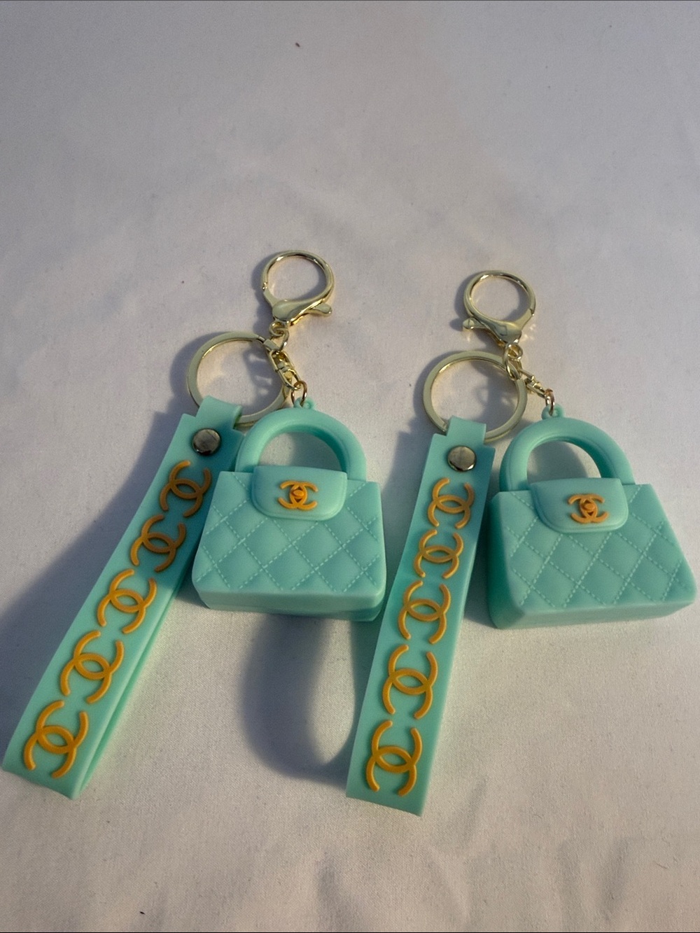 Aqua Quilted Mini Purse Keychain with Gold Logo Accent